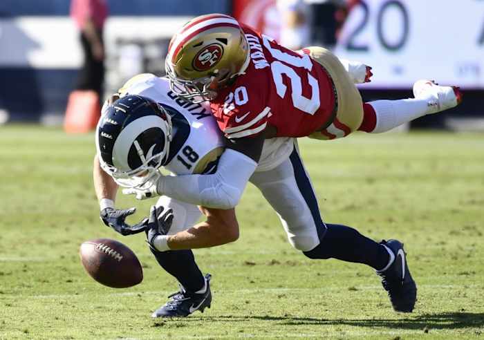 San Francisco 49ers cornerback Jimmie Ward (20) breaks up a pass to Los Angeles Rams wide receiver Cooper Kupp (18)